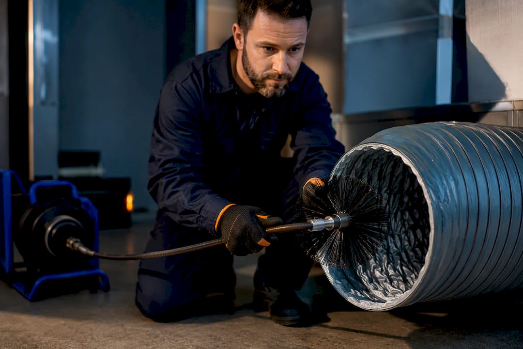 Rotary brush beside flexible duct liner